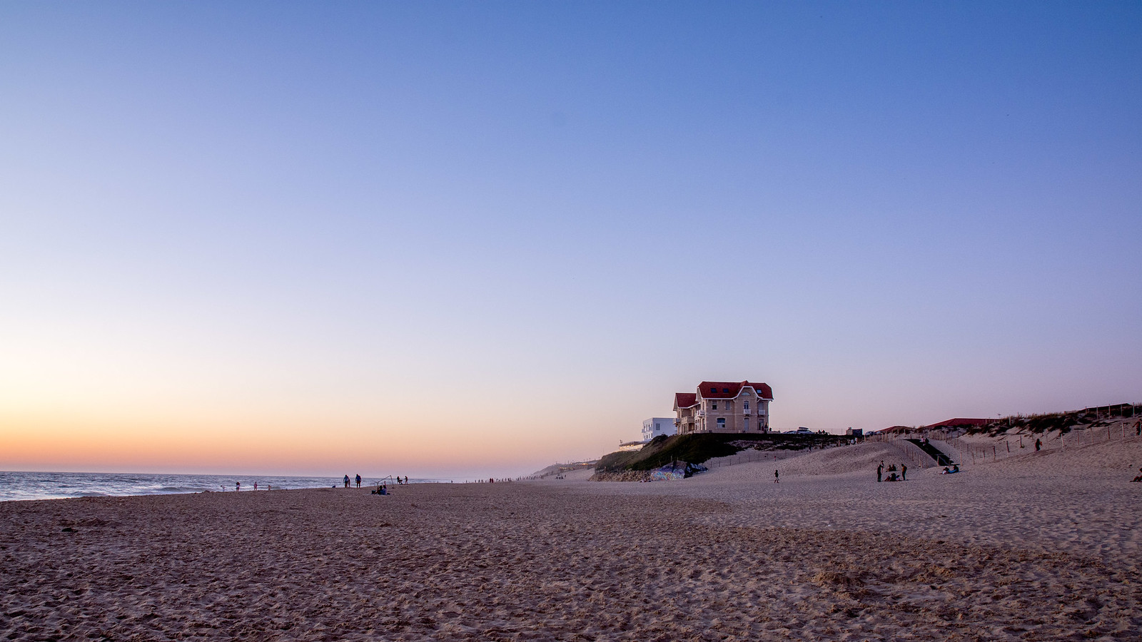 The Twin Houses at dusk, on the dune above the central beach of Biscarrosse